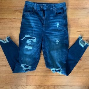 AE Dark blue jeans w/rips.  Size 8 short